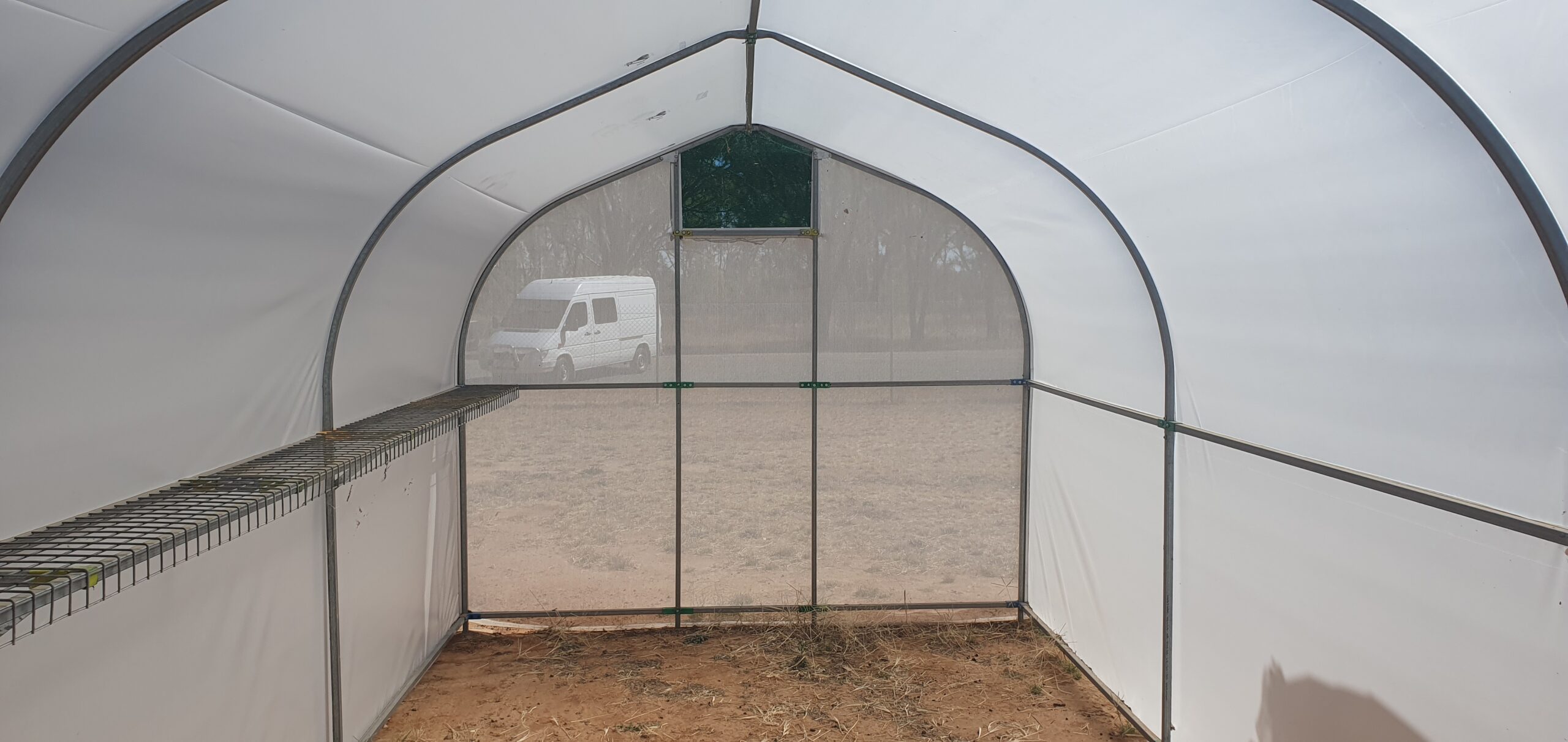 Interior view of empty domestic greenhouse